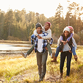 A family who is passionate about their health walking on a path