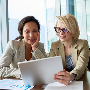 Business women reviewing information